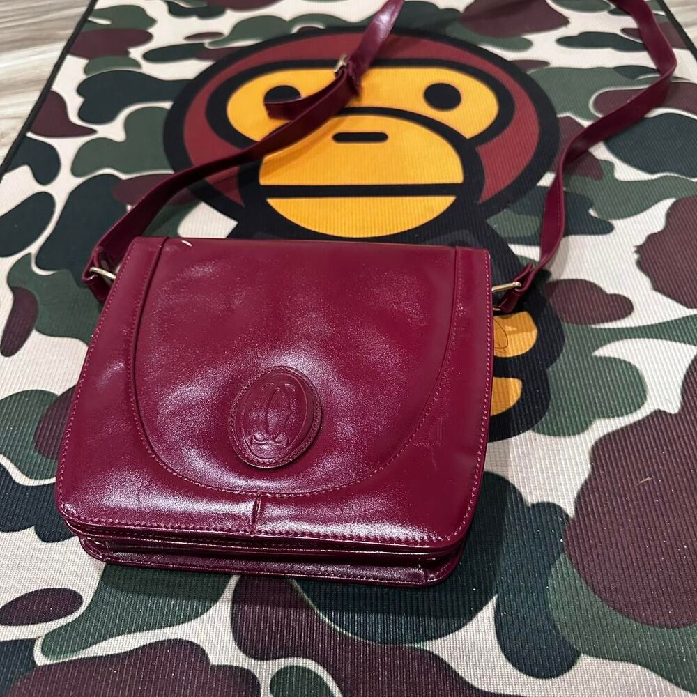 Burgundy Cartier Paris luxury crossbody bag